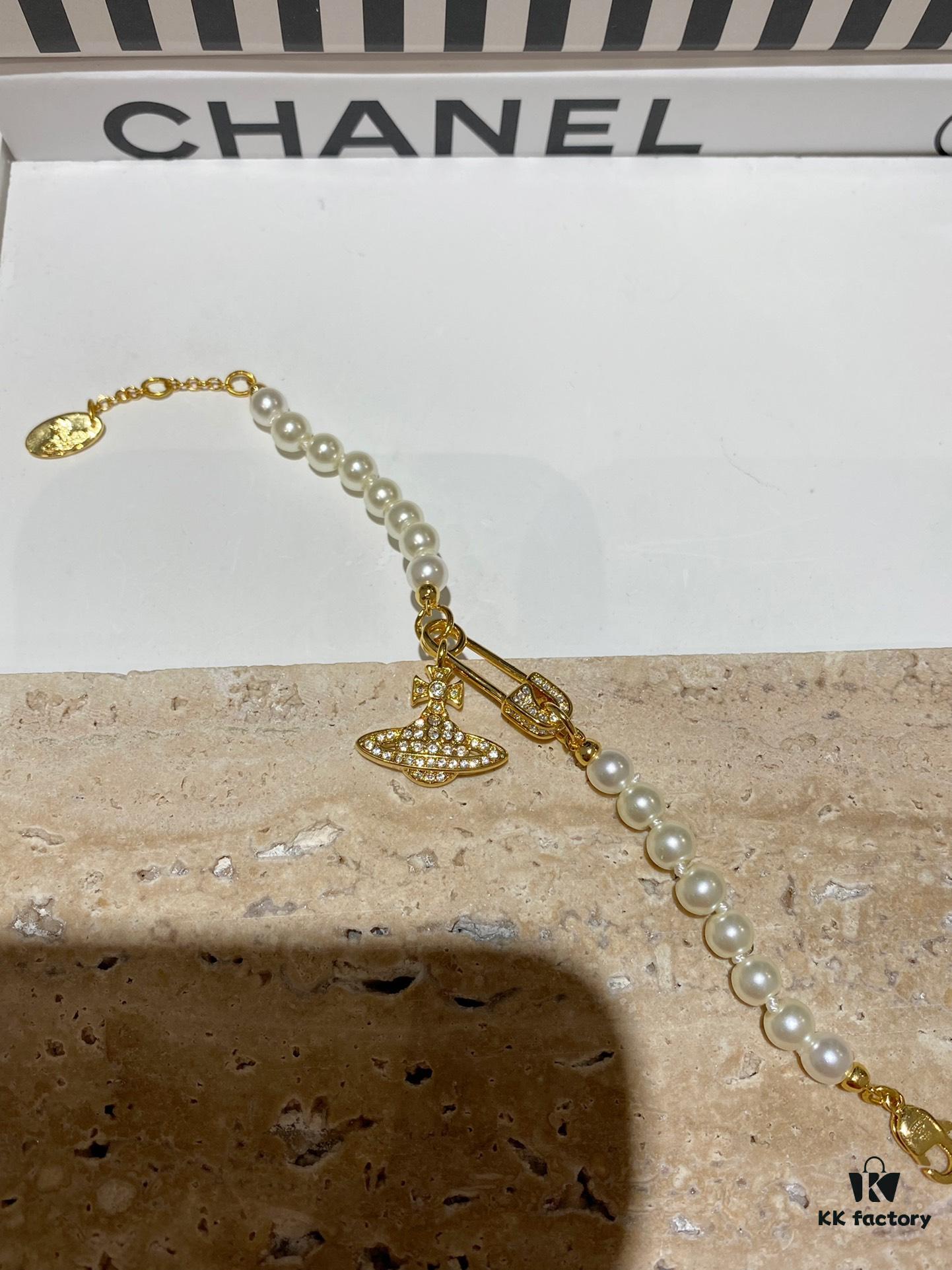 6930118812f62673a6fac584 Saturn | Vivienne Westwood Jewelry - Brooch Style Pearl Necklace and Bracelet