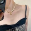 6930119112f62673a6fac58b Saturn | Vivienne Westwood Jewelry - Brooch Style Pearl Necklace and Bracelet