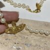 6930119312f62673a6fac58d Saturn | Vivienne Westwood Jewelry Pearl Necklace in Gold