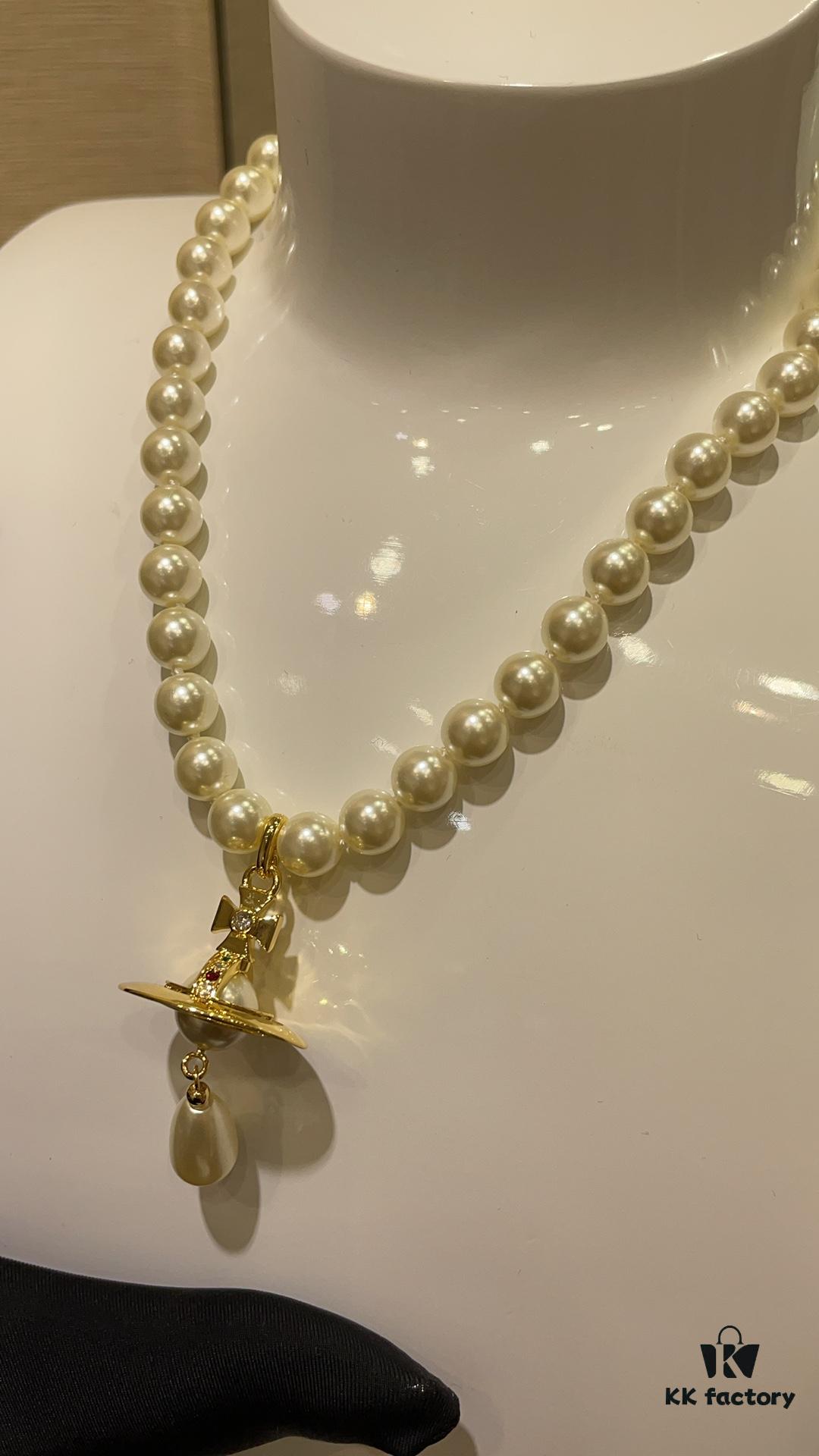 6930119b12f62673a6fac594 Vivienne Westwood Golden Saturn ORB Pearl Necklace