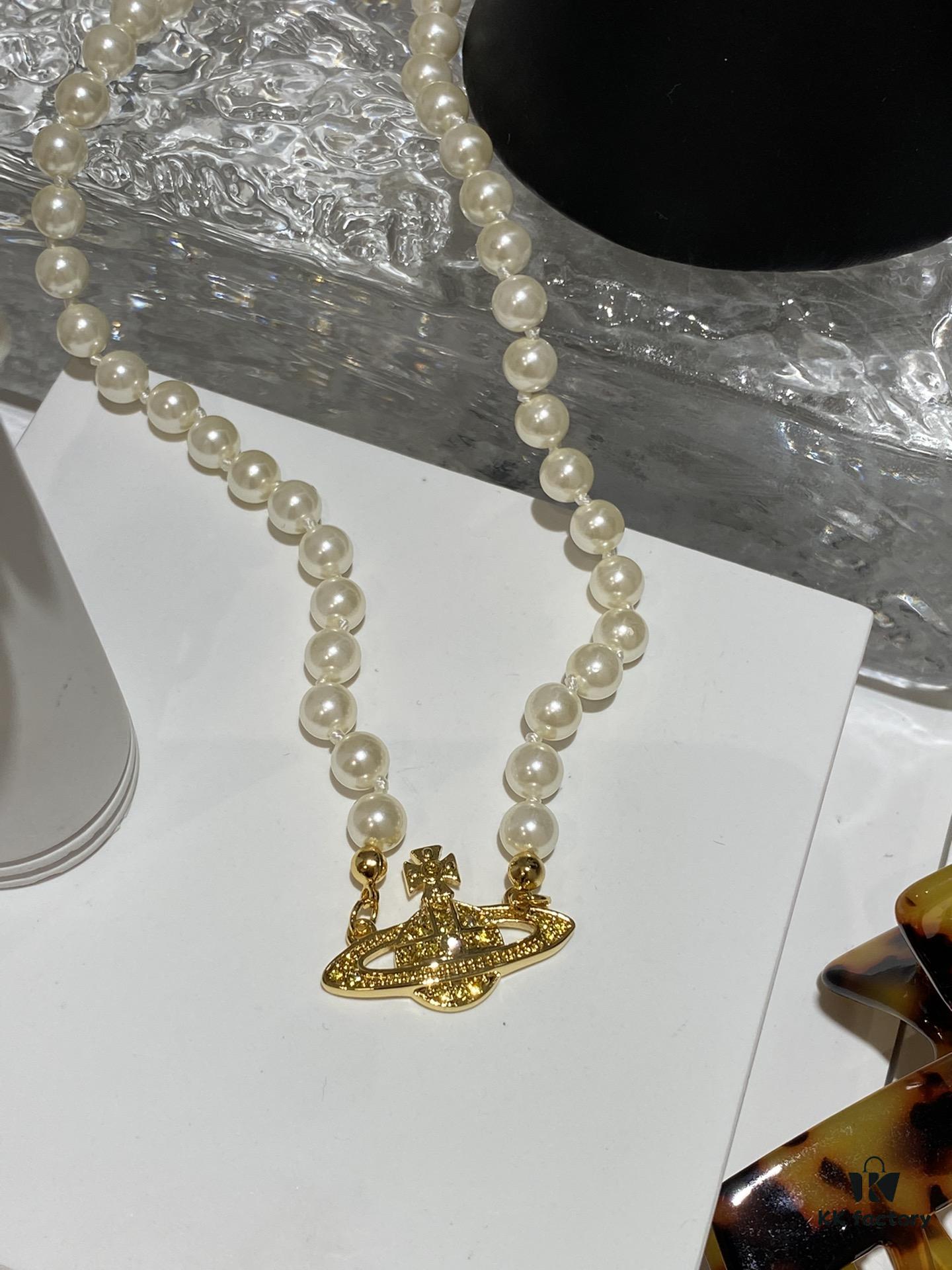 693011a012f62673a6fac599 Saturn | Vivienne Westwood Jewelry Pearl Necklace in Gold