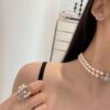 693011a212f62673a6fac59c Saturn | Vivienne Westwood Jewelry Double-Layer Pearl Necklace and Bracelet