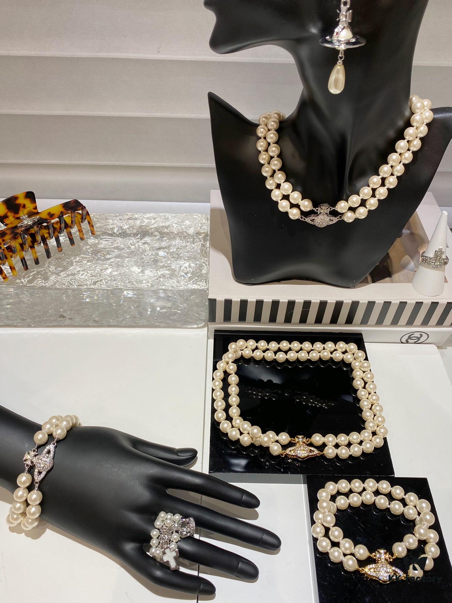 693011a412f62673a6fac59d Saturn | Vivienne Westwood Jewelry Double-Layer Pearl Necklace and Bracelet