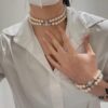 693011b412f62673a6fac5bc Vivienne Westwood Full Crystal Saturn Double Layer Pearl Bracelet