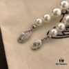 693011bb12f62673a6fac5c6 Vivienne Westwood Saturn Pearl Necklace - Medium Size, Rhinestone-Embellished Crown Pendant with Elegant Shine