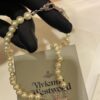 693011bf12f62673a6fac5cd New Arrival Today 🆕 Vivienne Westwood Pink Diamond Saturn Pearl Necklace in Silver