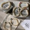 693011cc12f62673a6fac5db Vivienne Westwood Enamel Pearl Bracelet – Magnetic Clasp, Reversible Design, Six New 2023 Colors Available
