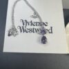 693011e812f62673a6fac5fa West Queen Purple Crystal Drop Necklace in White Gold Color