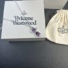 693011f612f62673a6fac606 West Queen Purple Crystal Drop Necklace in White Gold Color