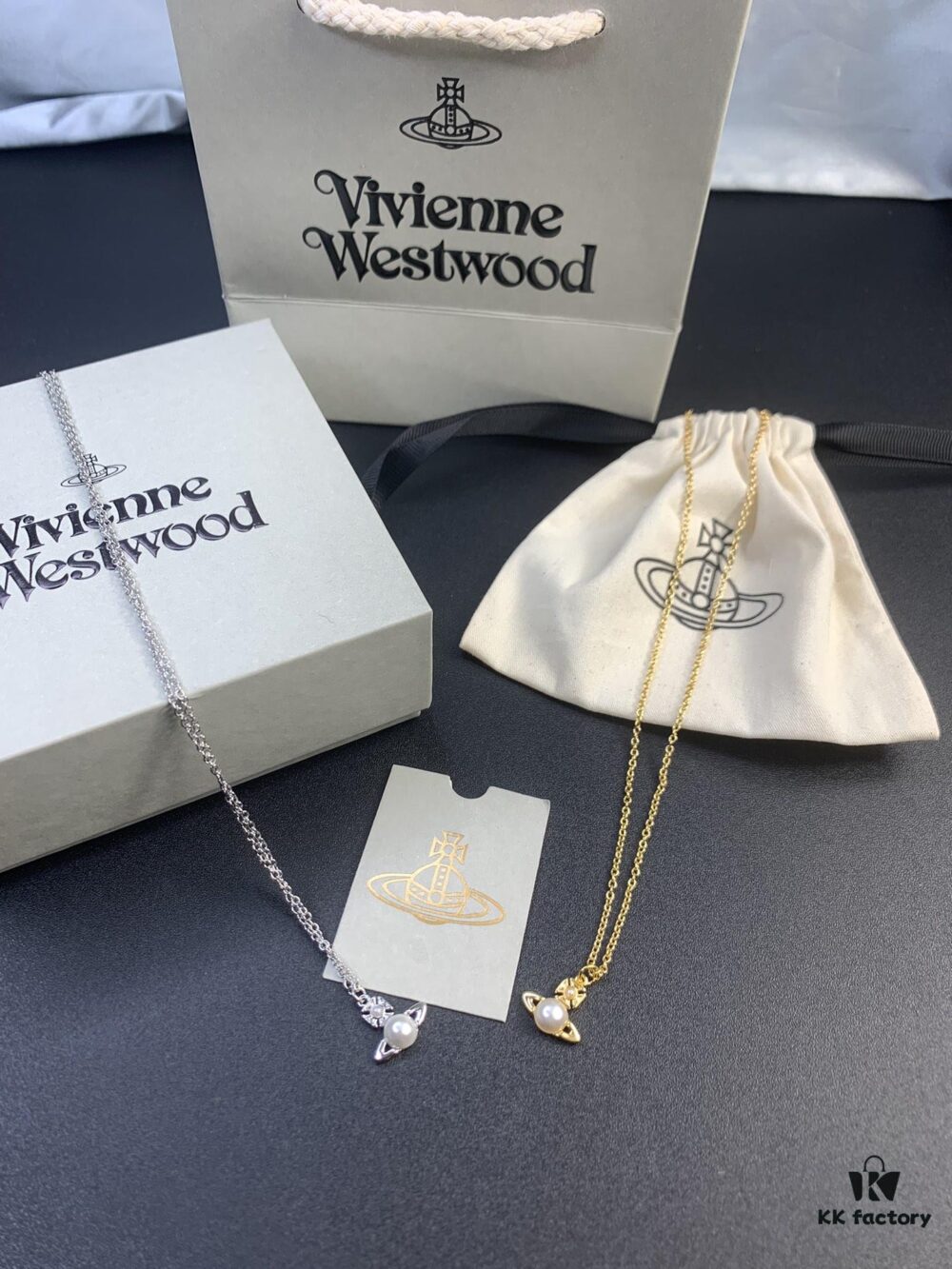 6930120012f62673a6fac614 West Queen Pearl Necklace in White Gold and Yellow Gold Two Tones
