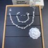 6930123012f62673a6fac64a Vivienne Westwood Bone Full Diamond Stud Earrings, Bracelet, and Necklace Set