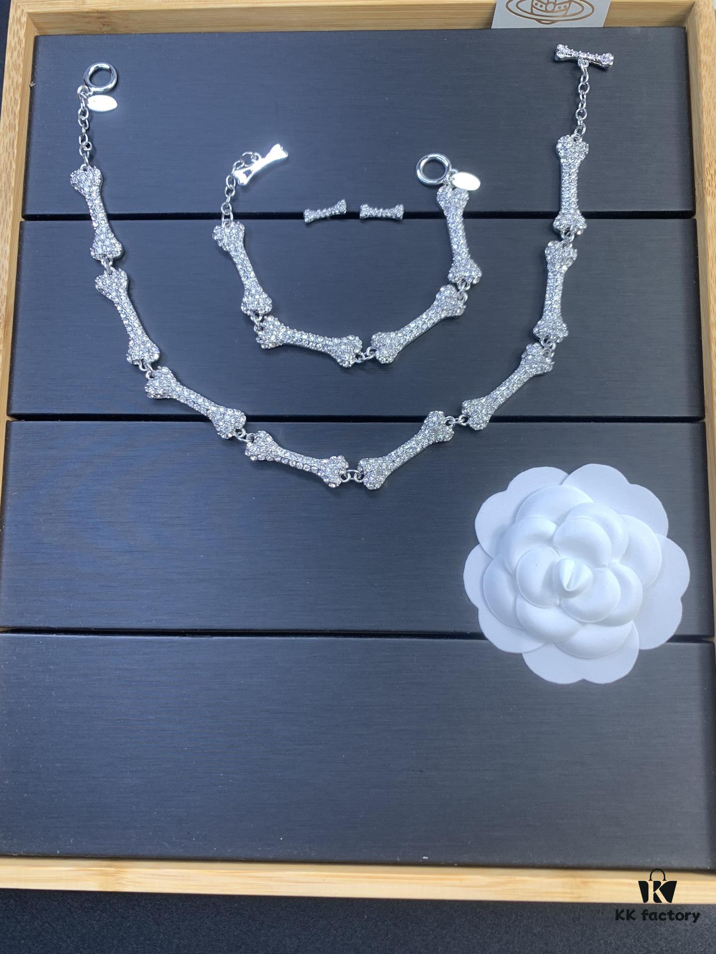 6930123912f62673a6fac652 Vivienne Westwood Bone Full Diamond Stud Earrings, Bracelet, and Necklace Set