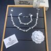 6930123a12f62673a6fac654 Vivienne Westwood Bone Full Diamond Stud Earrings, Bracelet, and Necklace Set