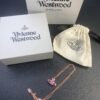 6930124412f62673a6fac660 West Queen Round Diamond Saturn Necklace in Rose Gold, White Gold, and Yellow Gold – In Stock in Three Colors