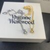 693012a712f62673a6fac6eb West Dame Mini Pearl Saturn Necklace in Gold and Silver Two Colors