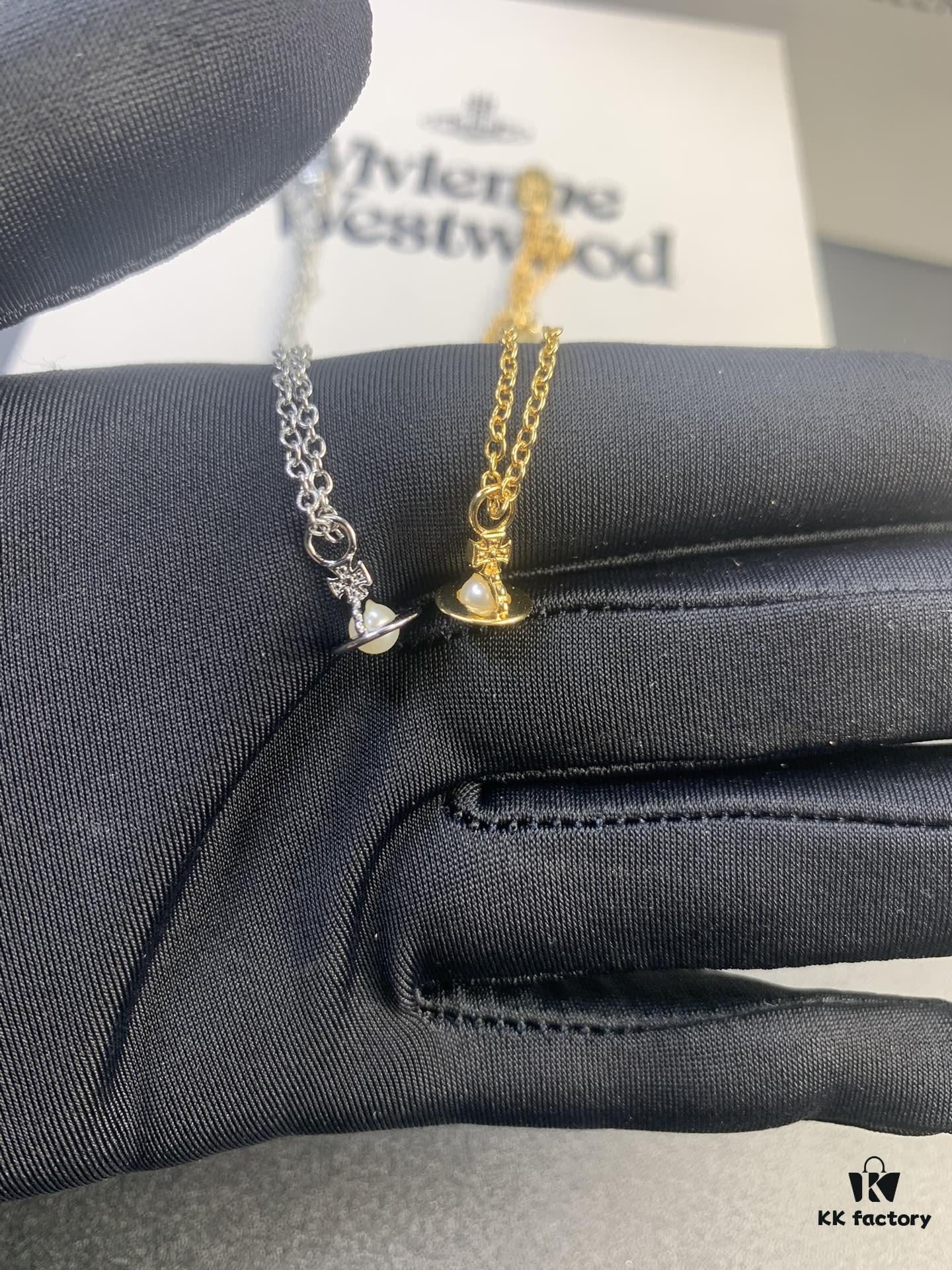 693012aa12f62673a6fac6f0 West Dame Mini Pearl Saturn Necklace in Gold and Silver Two Colors