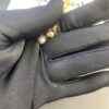 693012aa12f62673a6fac6f1 West Dame Mini Pearl Saturn Necklace in Gold and Silver Two Colors