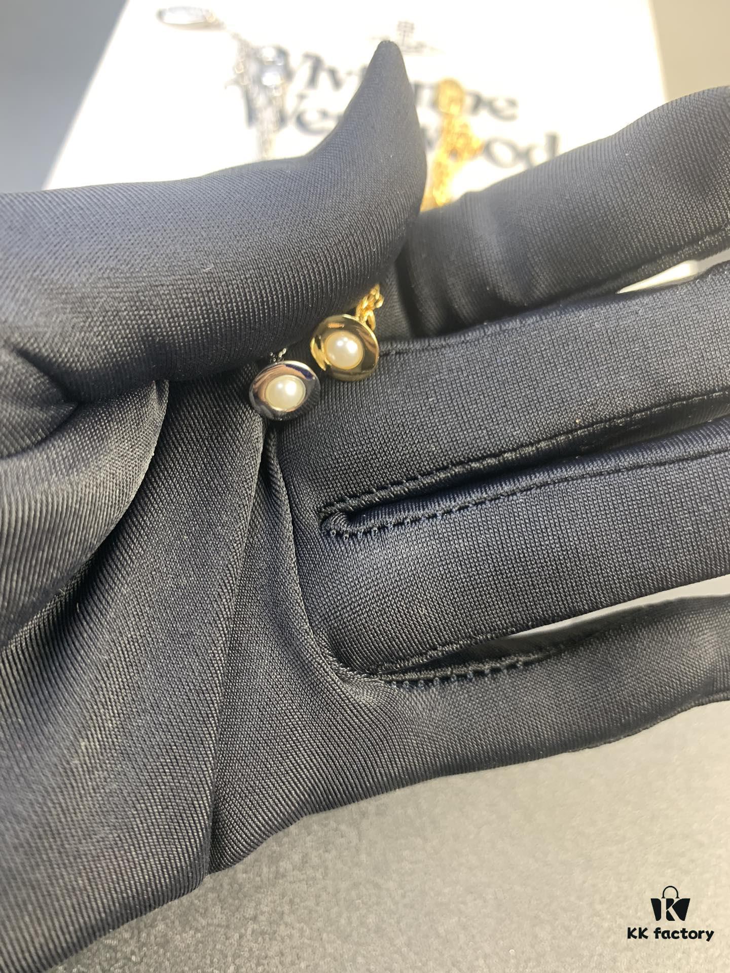 693012aa12f62673a6fac6f1 West Dame Mini Pearl Saturn Necklace in Gold and Silver Two Colors