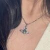 693012be12f62673a6fac70e West Grandma Rivet Saturn Blue Diamond Necklace and Stud Earring Set