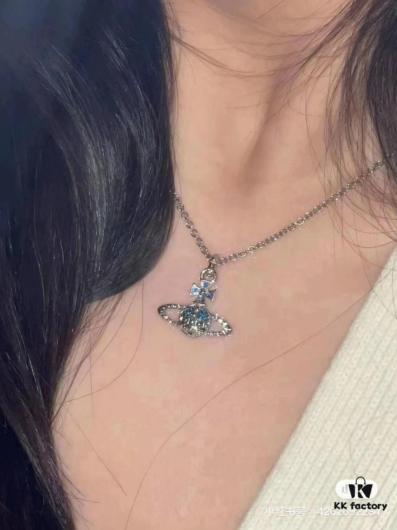 693012be12f62673a6fac70e West Grandma Rivet Saturn Blue Diamond Necklace and Stud Earring Set