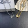 693012bf12f62673a6fac70f West Grandma Magnetic Clasp Saturn Chunky Chain in Gold and Silver Tones