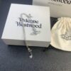 693012c012f62673a6fac711 West Grandma Rivet Saturn Blue Diamond Necklace and Stud Earring Set
