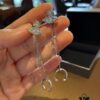 693012ef12f62673a6fac757 Vivienne Westwood Ear Studs - Punk-Inspired Fashion Statement in 925 Silver