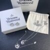 West Queen Half-Moon Saturn Ear Studs Bracelet Necklace Set in Gold and Silver Tones