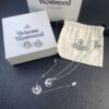 West Queen Half-Moon Saturn Ear Studs Bracelet Necklace Set in Gold and Silver Tones