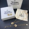 West Queen Half-Moon Saturn Ear Studs Bracelet Necklace Set in Gold and Silver Tones