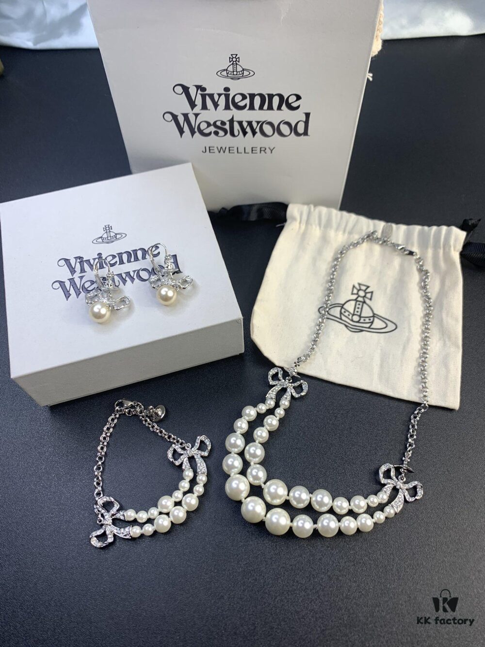 693012f712f62673a6fac767 West Queen Bow Double-Layer Pearl Set Stud Earrings Bracelet Necklace