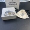 693012f812f62673a6fac768 Vivienne Westwood Saturn Double-Layer Rhinestone Ring, Luxurious and Elegant