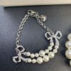 693012fa12f62673a6fac76b West Queen Bow Double-Layer Pearl Set Stud Earrings Bracelet Necklace