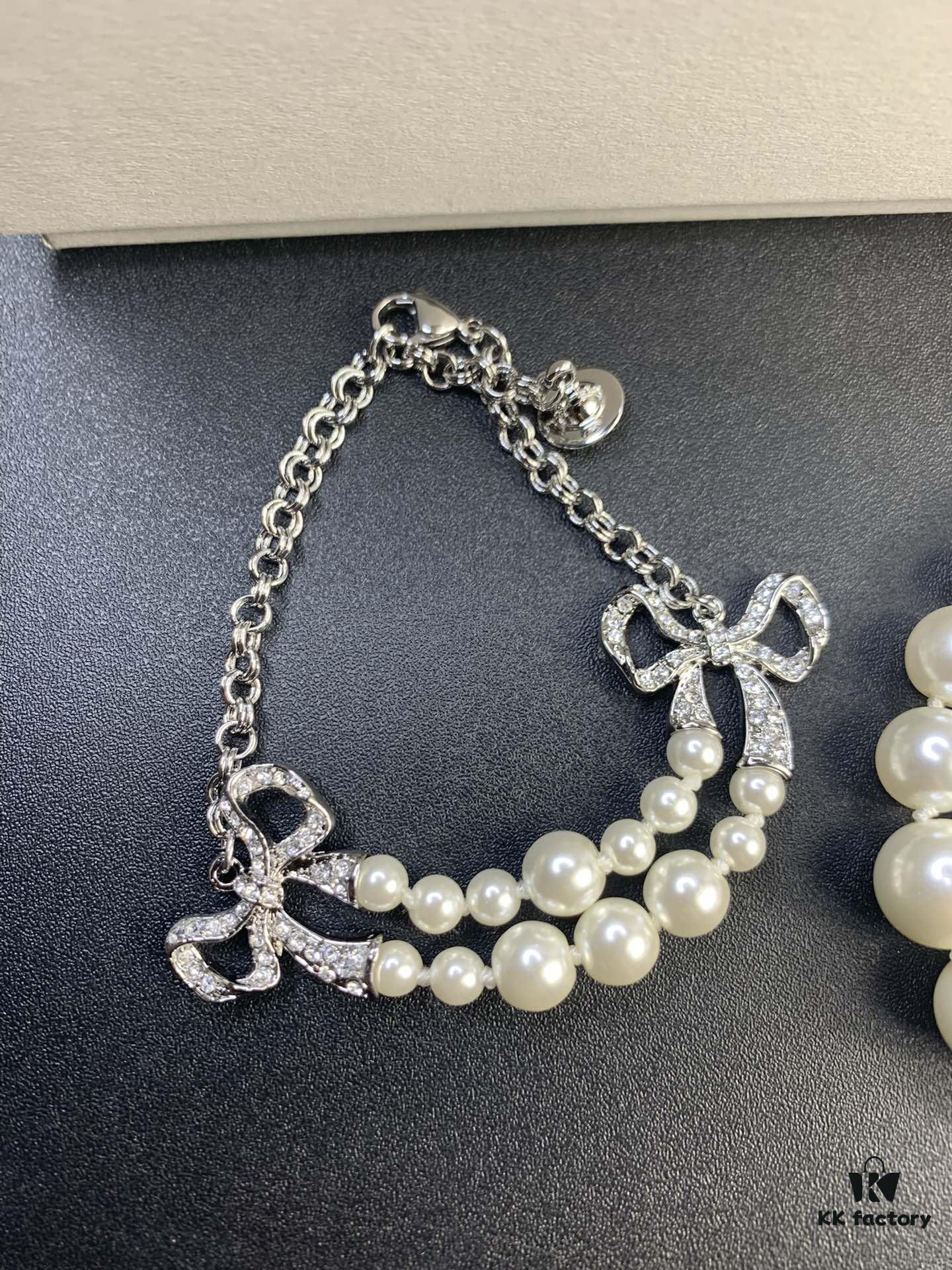 693012fa12f62673a6fac76b West Queen Bow Double-Layer Pearl Set Stud Earrings Bracelet Necklace