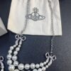 693012fb12f62673a6fac76c West Queen Bow Double-Layer Pearl Set Stud Earrings Bracelet Necklace