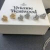 6930130312f62673a6fac77a Vivienne Westwood Pearl and Crystal Necklace and Stud Earrings Set, Available in Purple Crystal with White Shell and White Crystal with White Shell