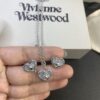 6930130812f62673a6fac780 Vivienne Westwood Pearl and Crystal Necklace and Stud Earrings Set, Available in Purple Crystal with White Shell and White Crystal with White Shell