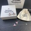 6930131a12f62673a6fac796 West Queen Pink Diamond Necklace, Bracelet, and Earring Set in Gold-Plated Material