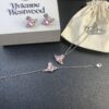 6930131a12f62673a6fac797 West Queen Pink Diamond Necklace, Bracelet, and Earring Set in Gold-Plated Material