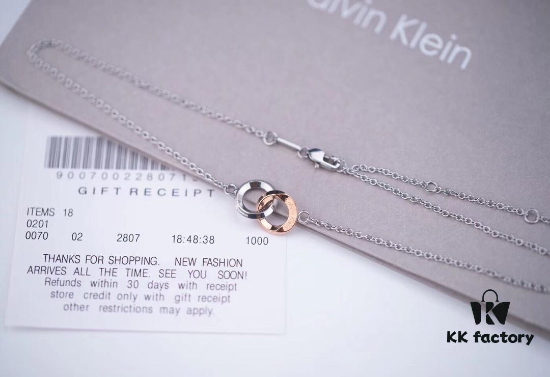 6930163912f62673a6facb73 Calvin Klein CK Double Ring Necklace, White Gold and Rose Gold Plated Couple Necklace