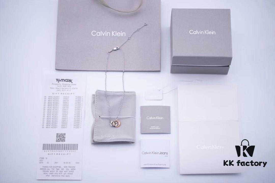 6930163912f62673a6facb76 Calvin Klein CK Double Ring Necklace, White Gold and Rose Gold Plated Couple Necklace