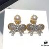 6930167612f62673a6facbec Miu Miu Bow Knot Stud Earrings, Guo Biting Same Style, Princess-like Charm, Dual-tone Gold-plated Craft with Swarovski Pearl