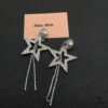 6930168212f62673a6facc00 Miu Miu Textured Luxury Pearl Heart Stud Earrings, Minimalist Design with Vintage Charm