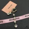 6930168412f62673a6facc02 Miu Miu Elegant Heart Pearl Stud Earrings, Minimalist Luxury Design with Vintage Charm