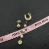 6930168412f62673a6facc04 Miu Miu Elegant Heart Pearl Stud Earrings, Minimalist Luxury Design with Vintage Charm