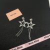 6930168912f62673a6facc0e Miu Miu Textured Luxury Pearl Heart Stud Earrings, Minimalist Design with Vintage Charm