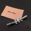 6930168a12f62673a6facc0f Miu Miu Textured Luxury Pearl Heart Hair Clip - Minimalist Design with Vintage Charm