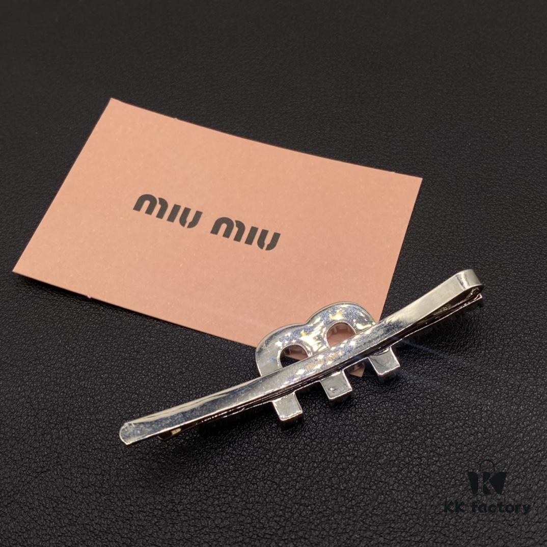 6930168a12f62673a6facc0f Miu Miu Textured Luxury Pearl Heart Hair Clip - Minimalist Design with Vintage Charm