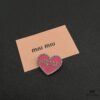 6930169412f62673a6facc18 Miu Miu Textured Heart Luxury Pearl Brooch, Minimalist Love Design, Vintage-Inspired Fashion Statement Piece
