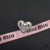 6930169412f62673a6facc19 Miu Miu Textured Heart Luxury Pearl Brooch, Minimalist Love Design, Vintage-Inspired Fashion Statement Piece